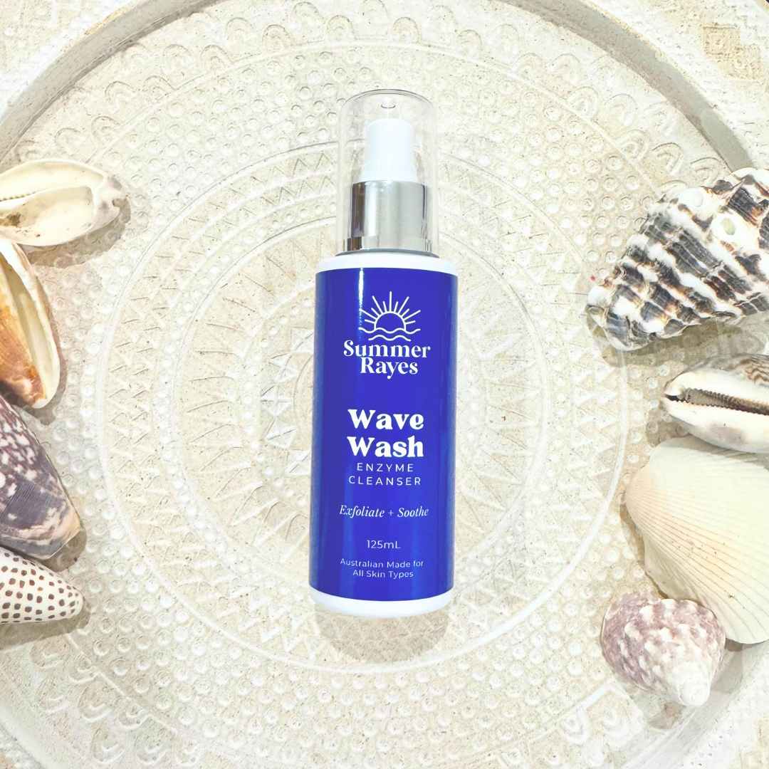 Summer Rayes teen skincare for Boys & Girls Wave Wash bottle on a textured surface with seashells
