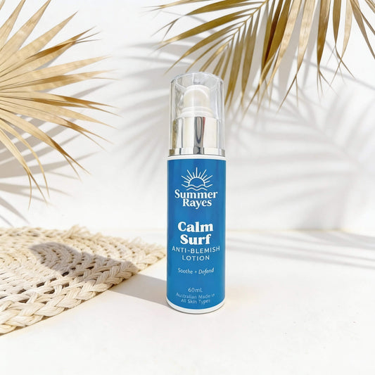 Summer Rayes Calm Surf lotion bottle on a light background with palm leaves