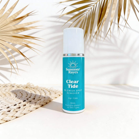 Summer Rayes Clear Tide blemish spot remover bottle with palm leaves in the background