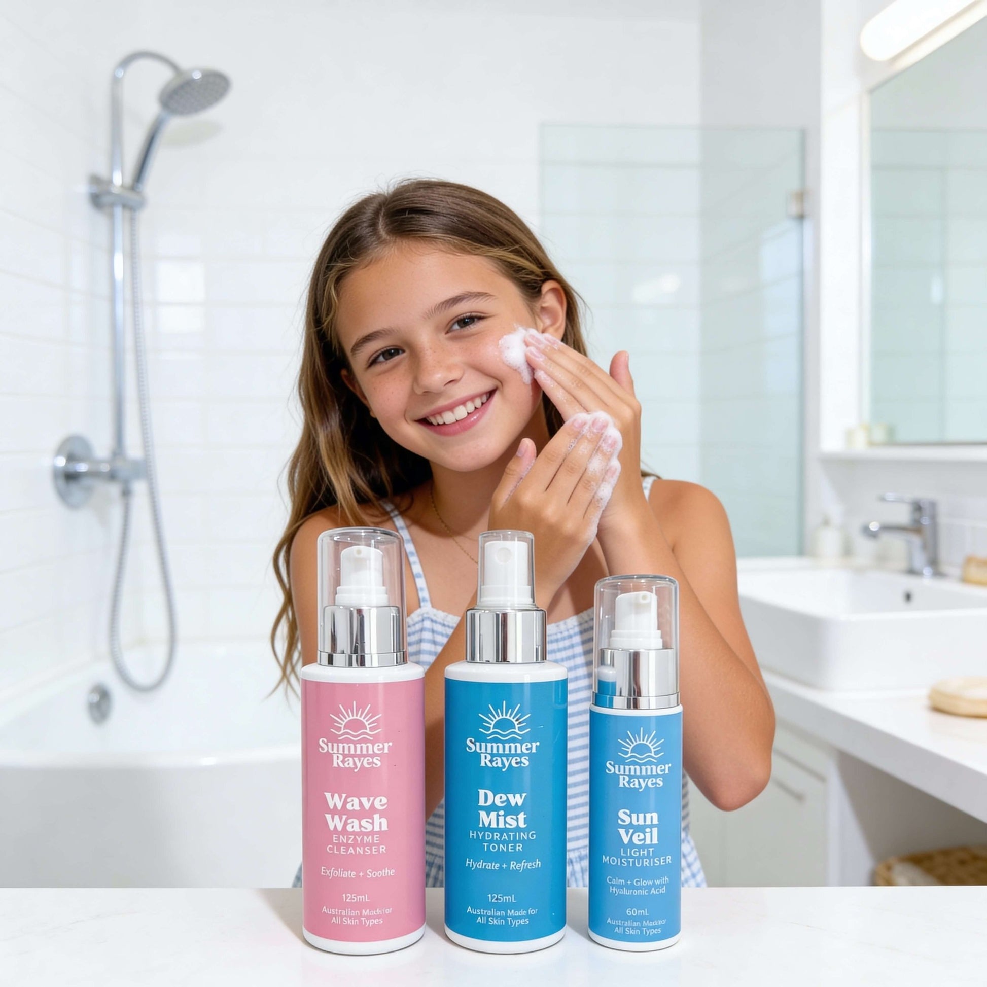 Girl applying teen moisturiser cream with Summer Rayes skincare products in a bathroom.