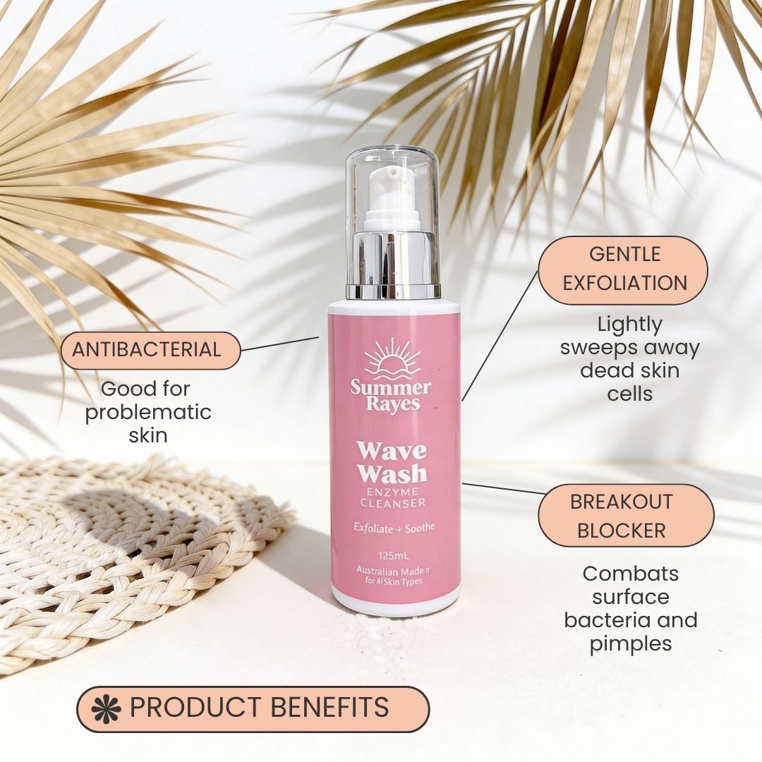 Summer Rayes Wave Wash Enzyme Cleanser bottle with product benefits text on a white background with palm leaves.