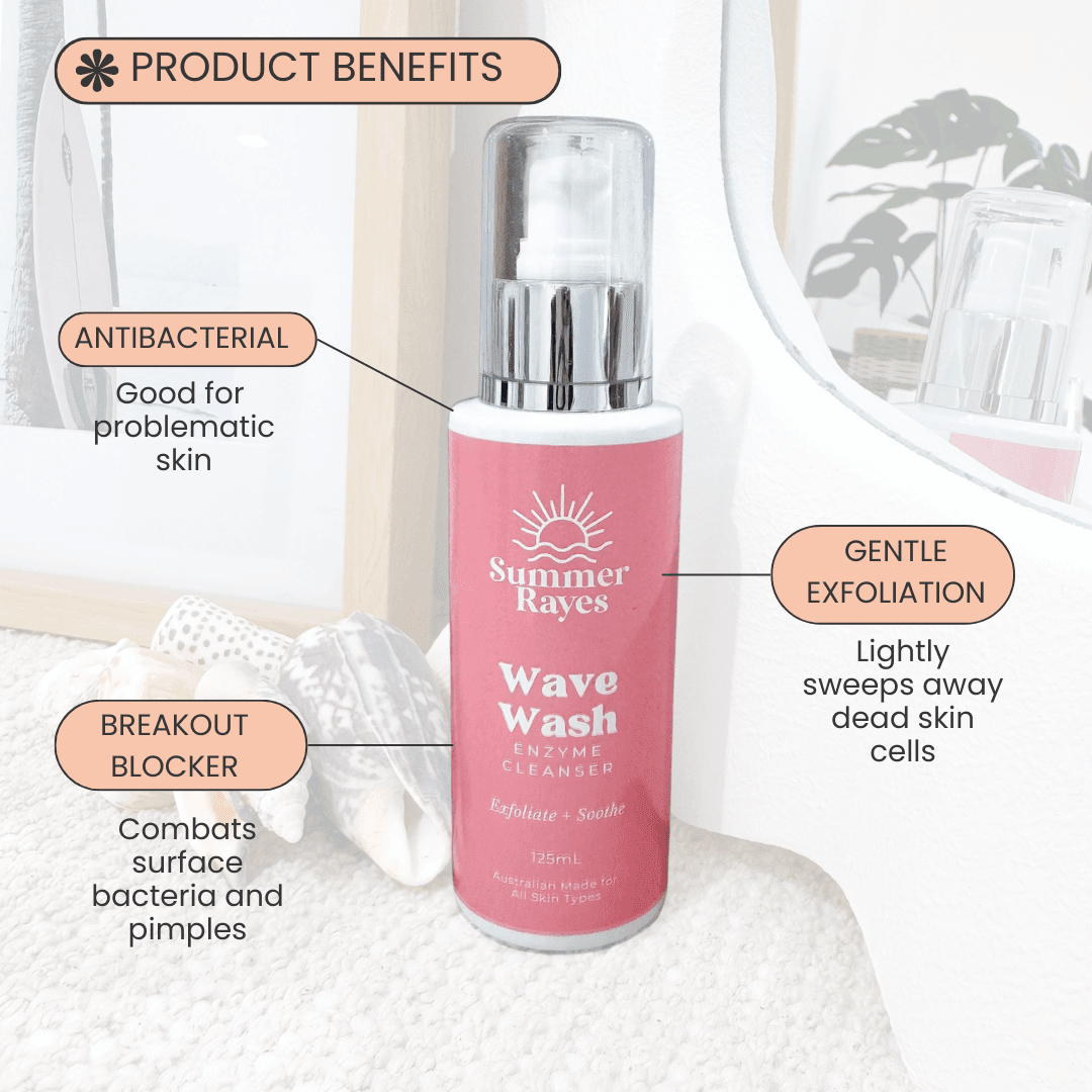 Pink bottle of Summer Rayes Wave Wash Enzyme Cleanser with product benefits text on a white background