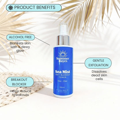 Summer Rayes Sea Mist Anti-Blemish Toner 120ml bottle displayed on a light surface with decorative palm leaves. The image includes callout labels highlighting product benefits