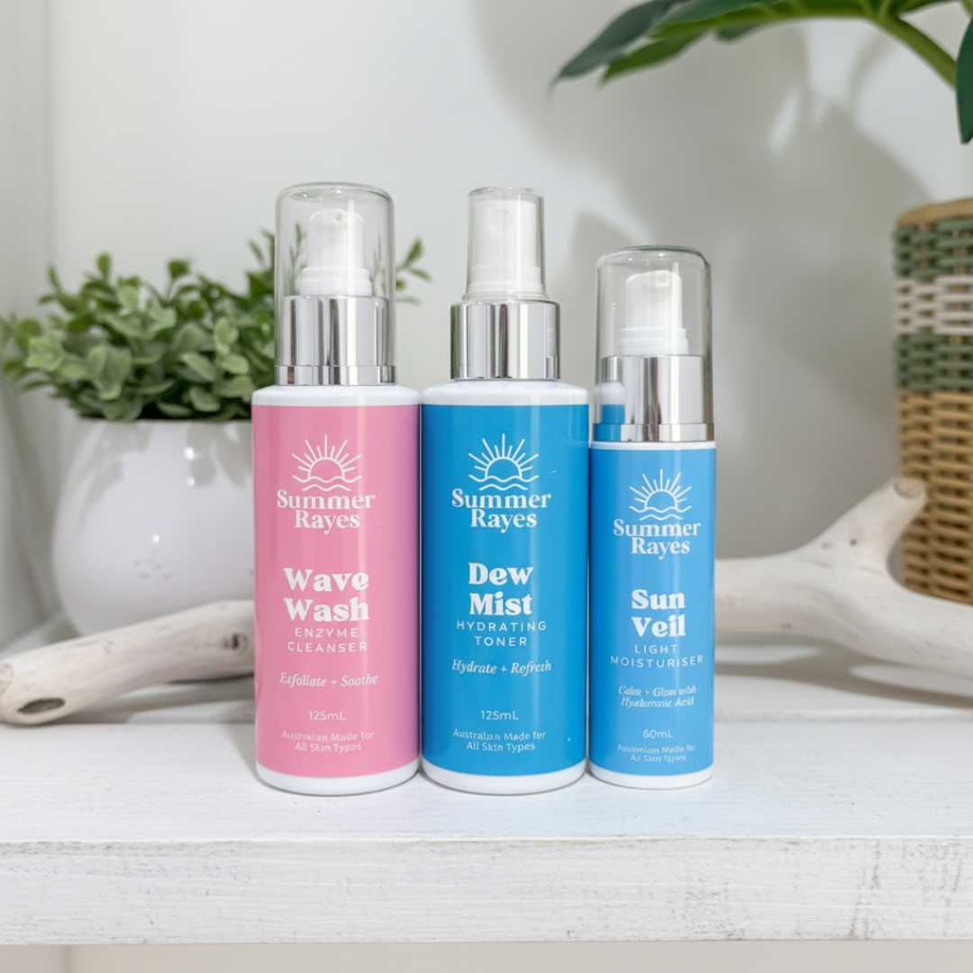 Three Summer Rayes teenage skincare products on a white surface with a plant in the background